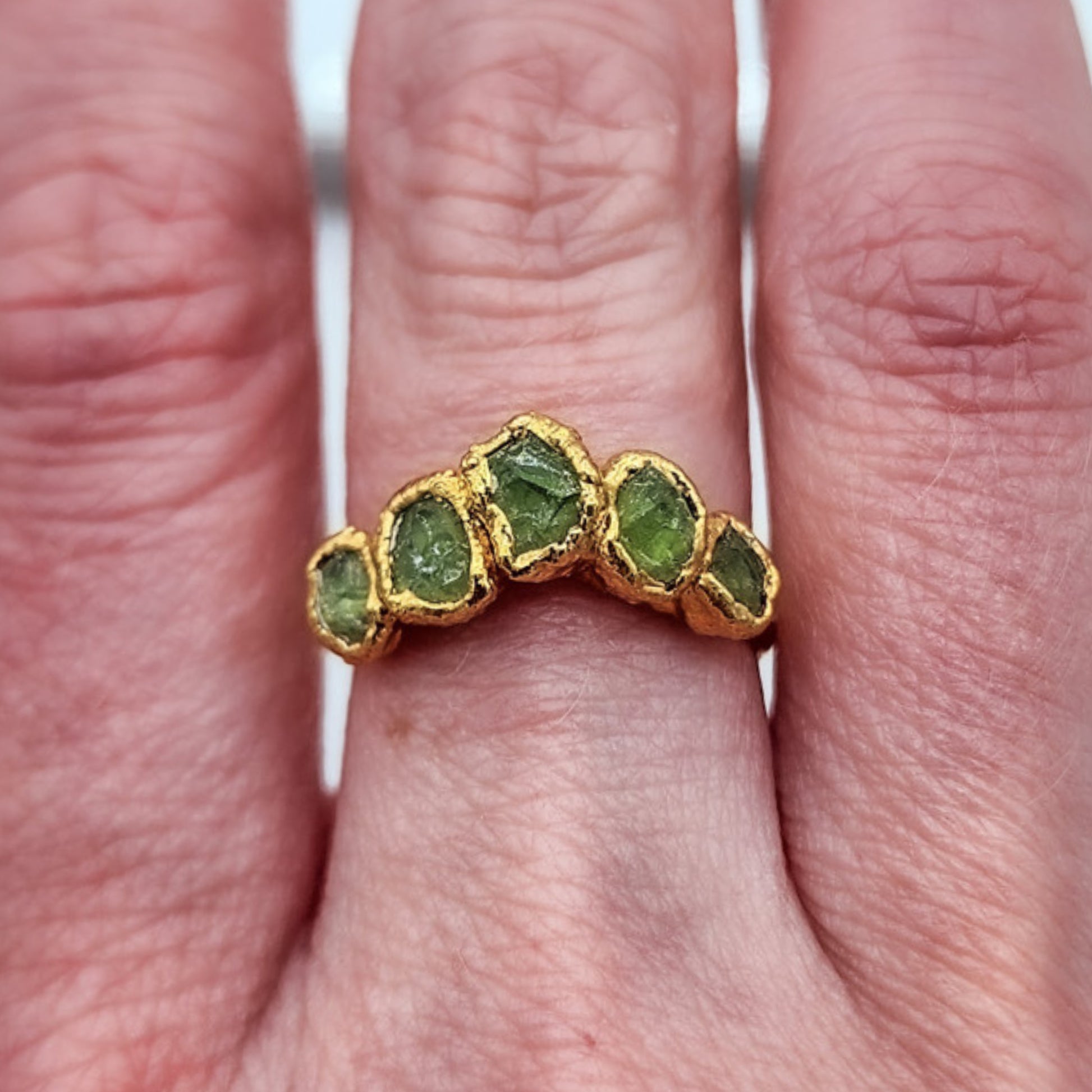 raw peridot ring